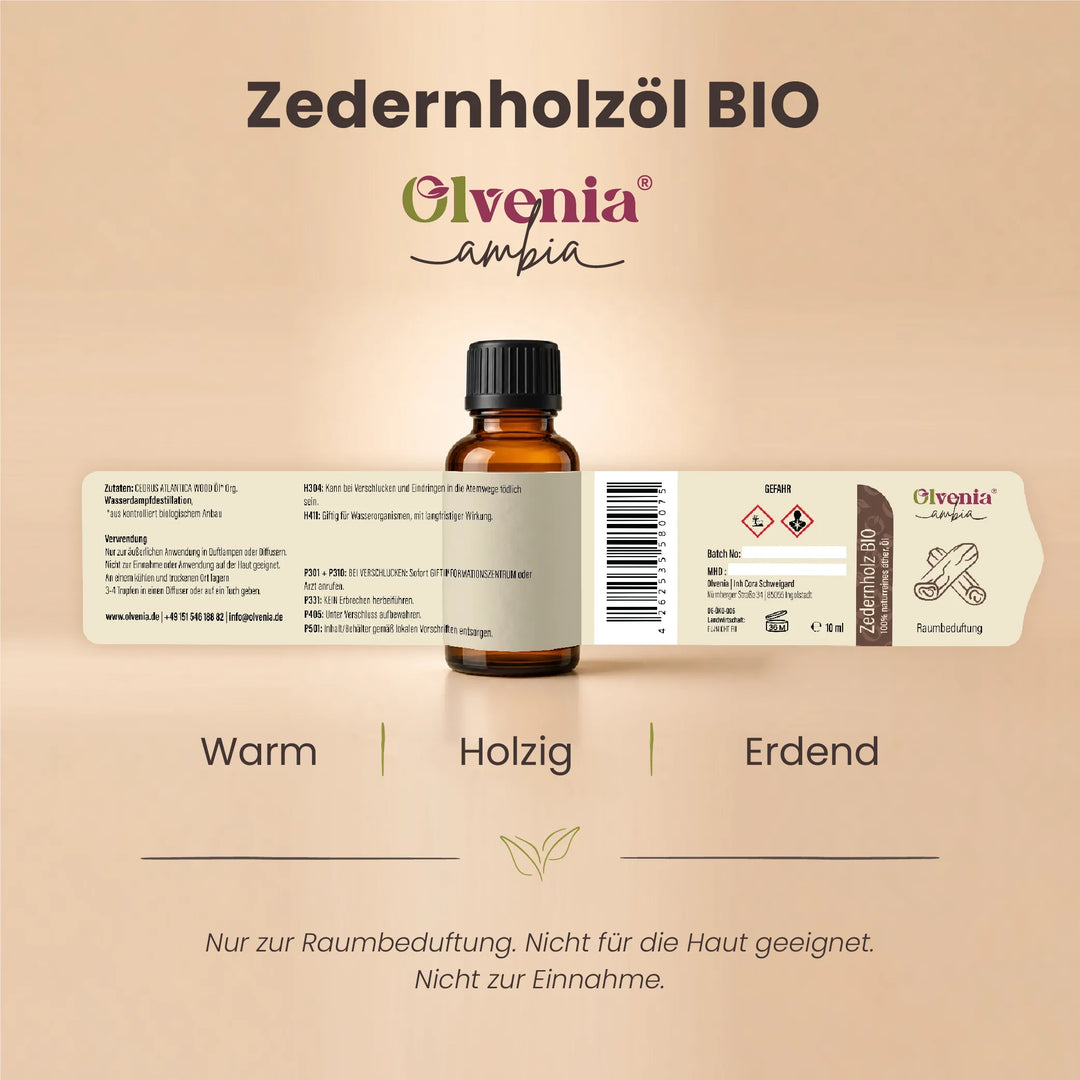 Produktkarte für Olvenia Ambia Zedernholzöl  Bio mit Etikett, Flasche und Duftprofil warm, holzig und erdend